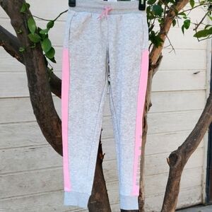 Puma girl's joggers size M (8-10) color grey and pink
